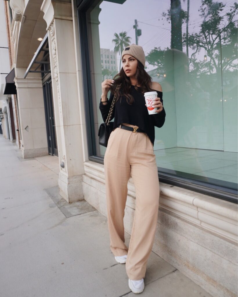 woman wearing white sneakers for Must-Have Shoes For Every Woman 